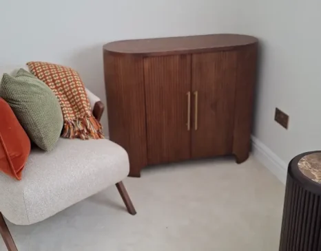 Wooden storage cabinet in a counselling room